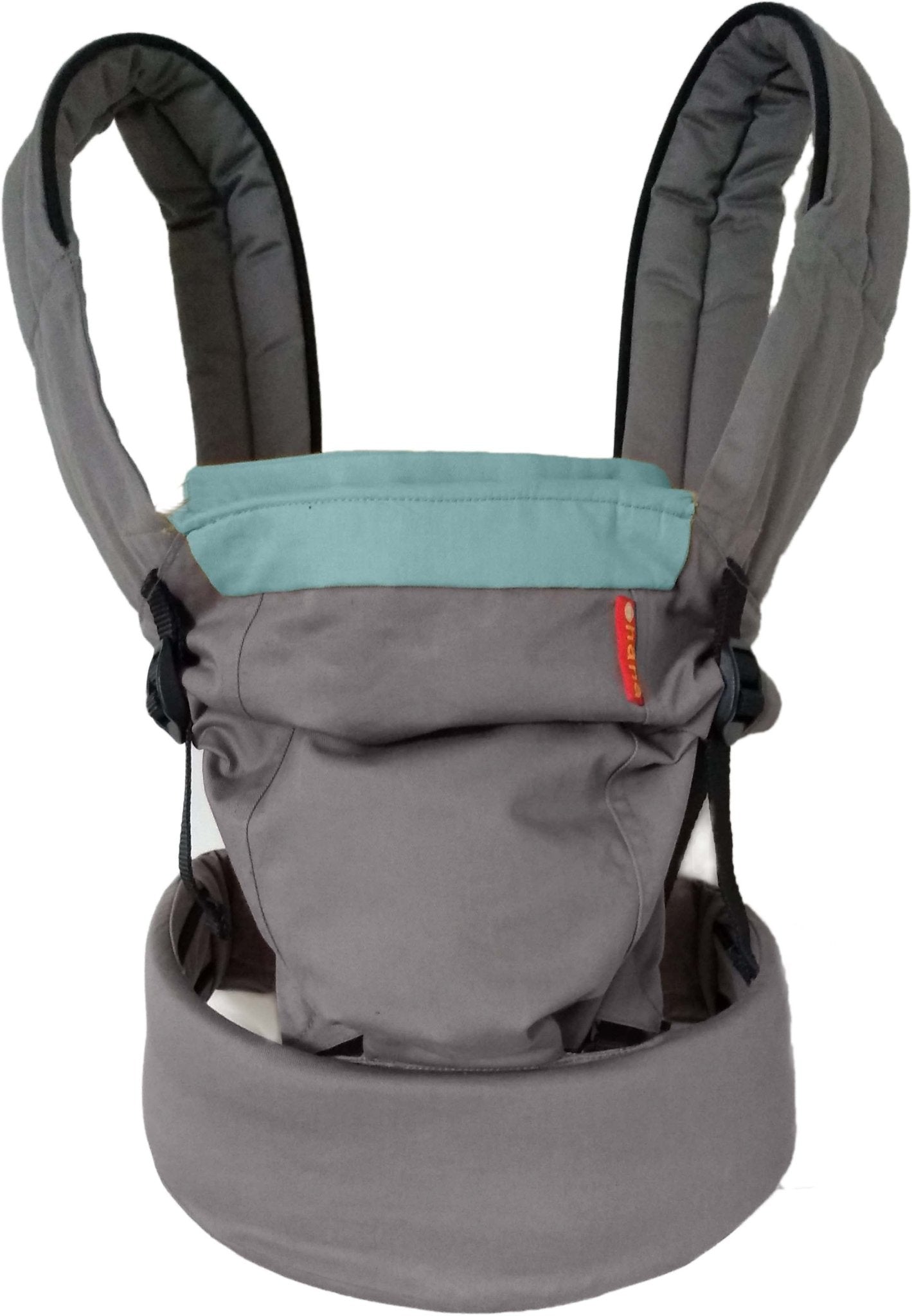 A blue and grey carrier for newborn against a white studio backdrop.
